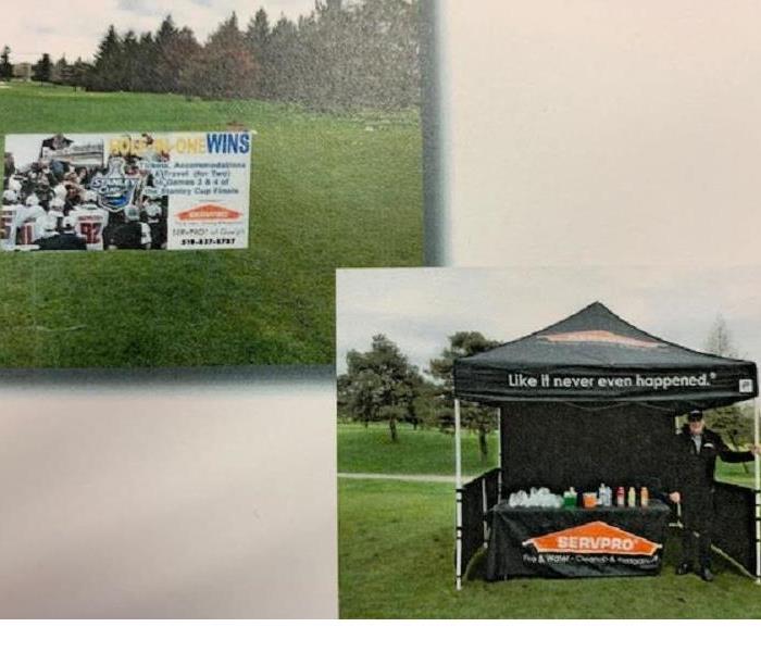 SERVPRO of Guelph hole in one sign and booth at the Children's Foundation Fundraiser 